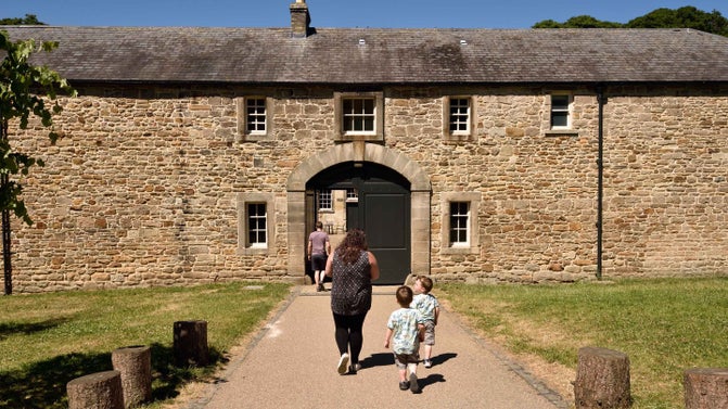 Visitors walking towards the Stables at Gibside, Tyne & Wear